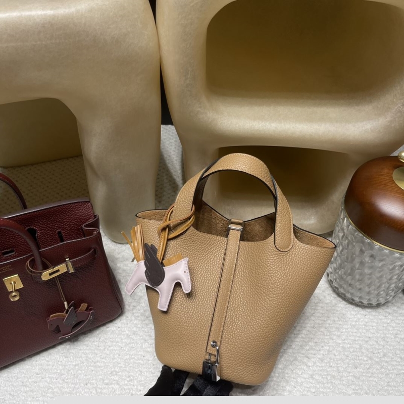 H**mes shopping bags